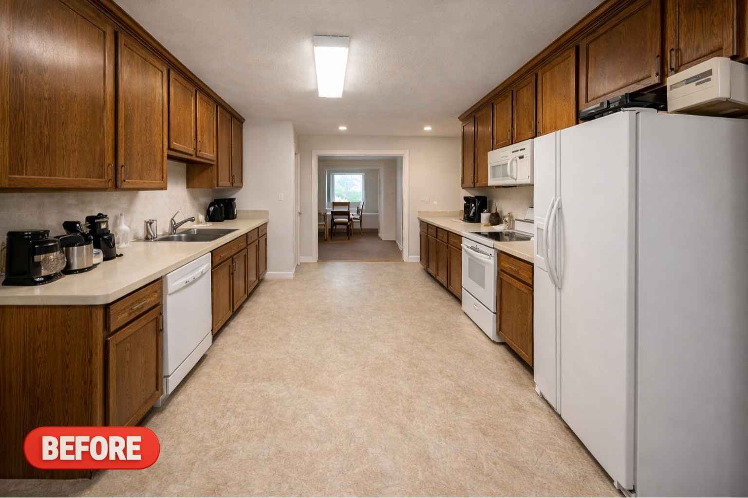Outdated 1990s galley kitchen before complete remodel by Spring Kitchen Pros in Gleannloch Farms Spring TX